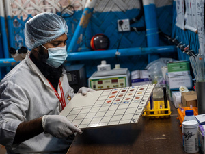 A lab technologist tests blood samples at a health care centre in Kutupalong refugee camp, Cox’s Bazar, Bangladesh. 
