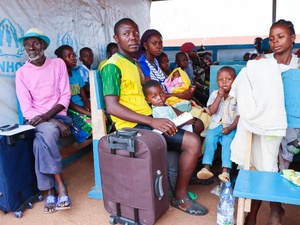 Returning refugee families wait at a transit centre in the Central African capital Bangui
