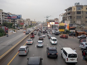 Three lanes of traffic head south out of Sidon, Lebanon.