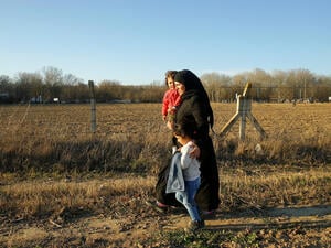 A mother and her two children were among the thousands of  refugees and migrants who reportedly made their way to the border over the past days.
