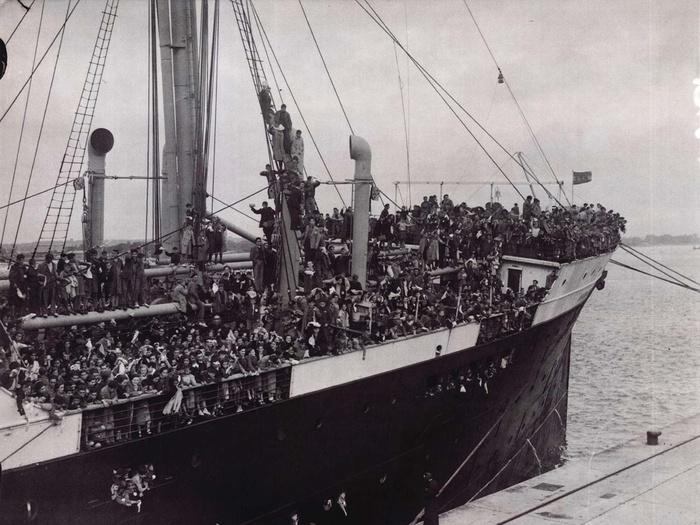 A boat with many people on the deck