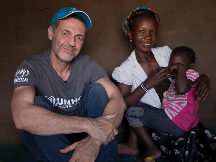 Uganda. UNHCR Goodwill Ambassdor Khaled Hosseini meets South Sudanese refugee, Aisha, in Bidibidi refugee settlement