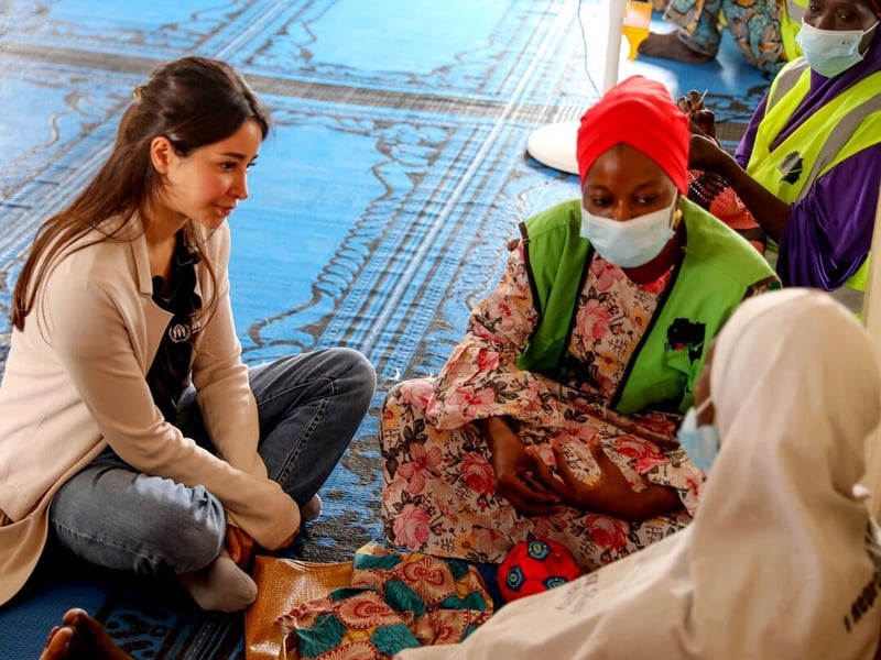 Aseel Omran listens to displaced women and children in a safe space in Maiduguri, Borno State, Nigeria.