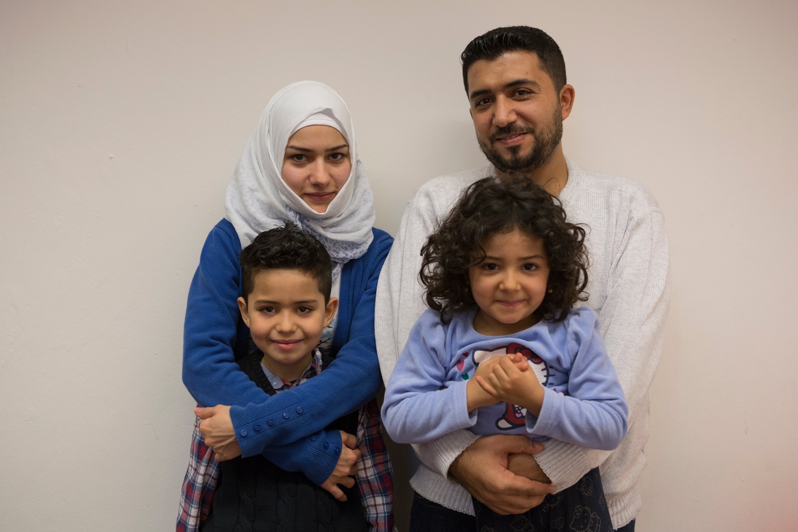 Germany. Actor Ben Stiller meets Nahed and her family at an emergency shelter in Berlin