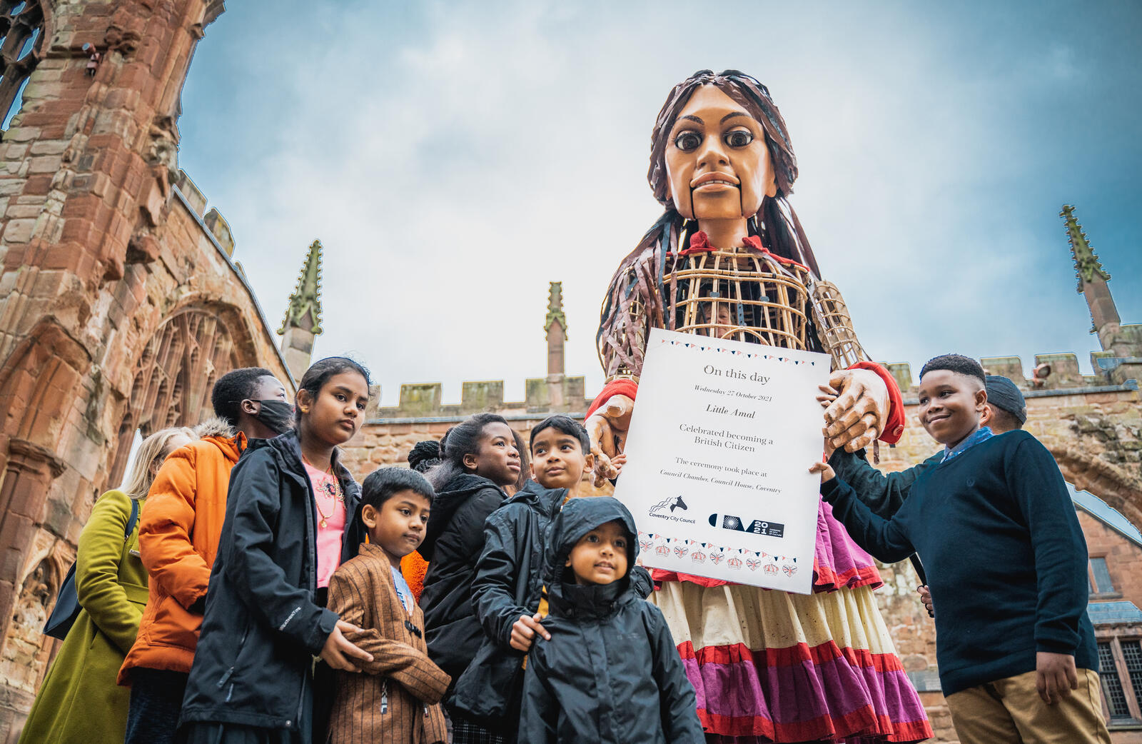 Over 2000 people came to welcome Little Amal to Coventry. In the afternoon, Amal attended the UK's first Children's Citizenship Ceremony and in the evening participated in an evening of performances.