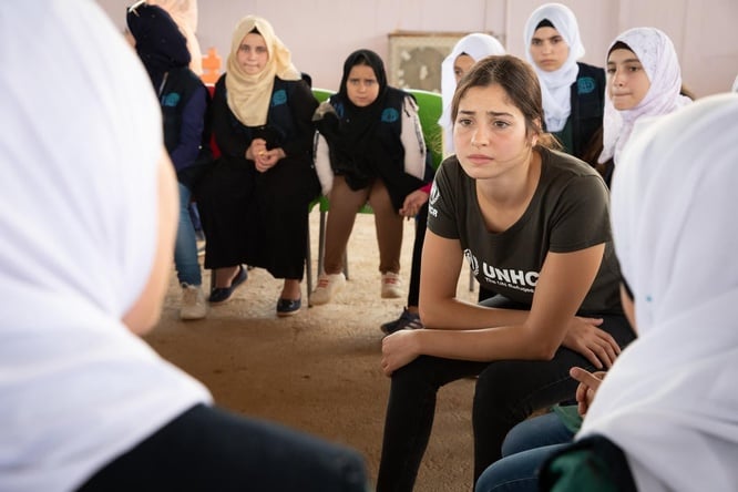 UNHCR Goodwill Ambassador Yusra Mardini meets TIGER girls during a visit to a UNHCR-supported community centre in the Zaatari refugee camp in Jordan. 