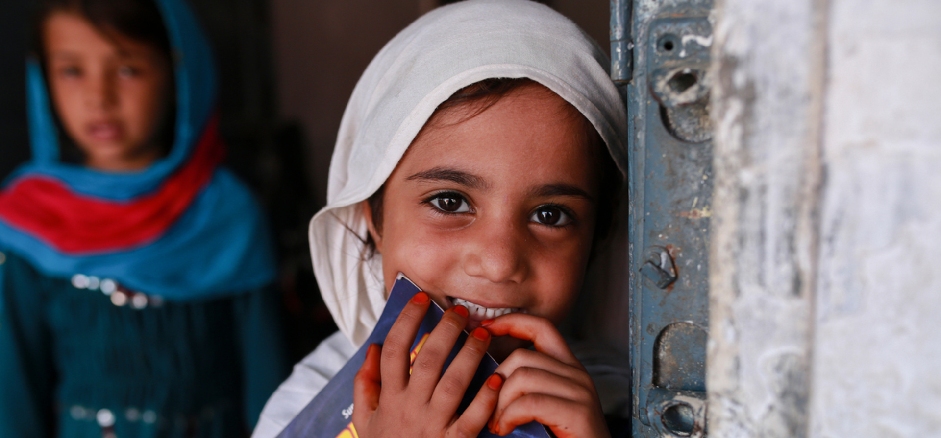 Pakistan. Aqeela Asifi running girls school at Afghan refugee village