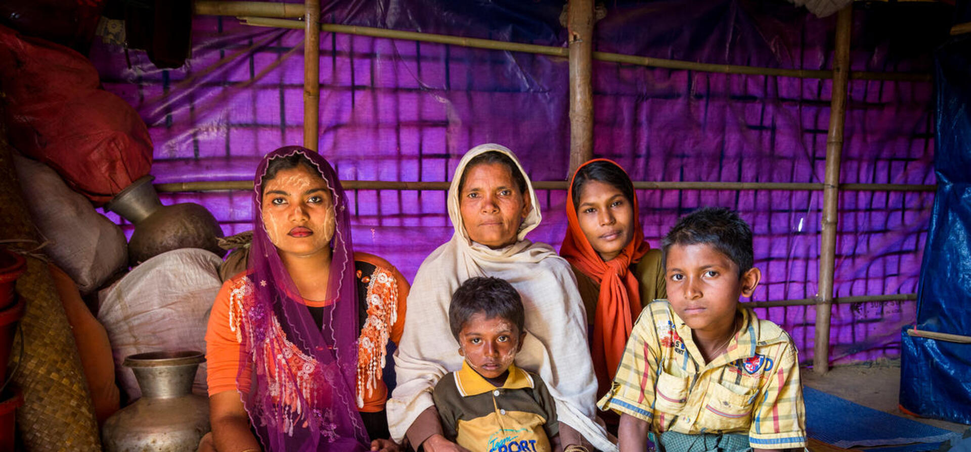 Bangladesh. Female head of households recieve assistance from Community Outreach Volunteers