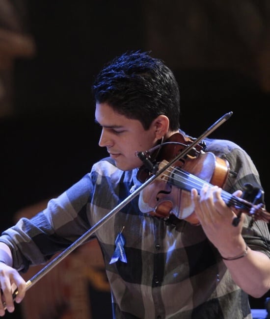 Sayd playing the violin