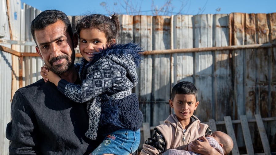 Jordan. Refugee family endure cold winter in Azraq camp