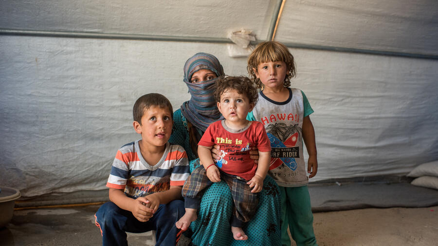 Iraq. People adjusting to life after losing their husbands and fathers.
