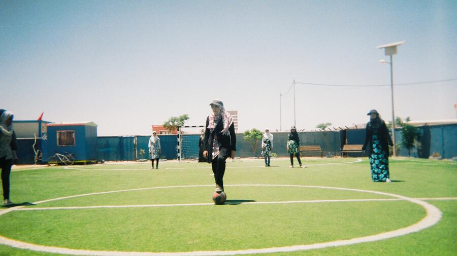 UNICEF Jordan, Zaatari. A girls' football team run by the UNICEF Makani programme. Makani ('My Space' in Arabic) centres provide a safe space for children and young people to access learning opportunities, child protection, life skills, and other critical services.