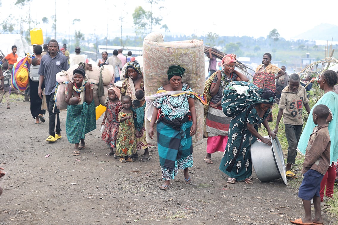 Mwamini Maheshe, 45, mother of 10 children, displaced from Sake arrives at Mugunga