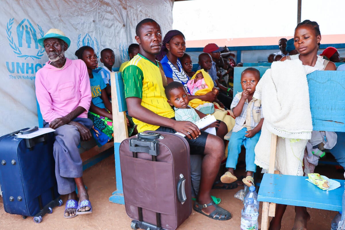 Returning refugee families wait at a transit centre in the Central African capital Bangui