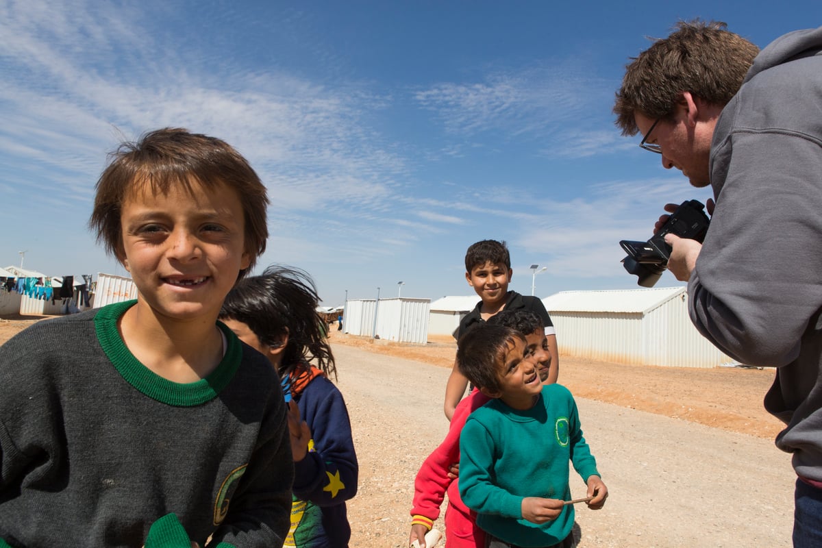 Jordan. UNHCR High Profile Supporter John Green in Azraq refugee camp