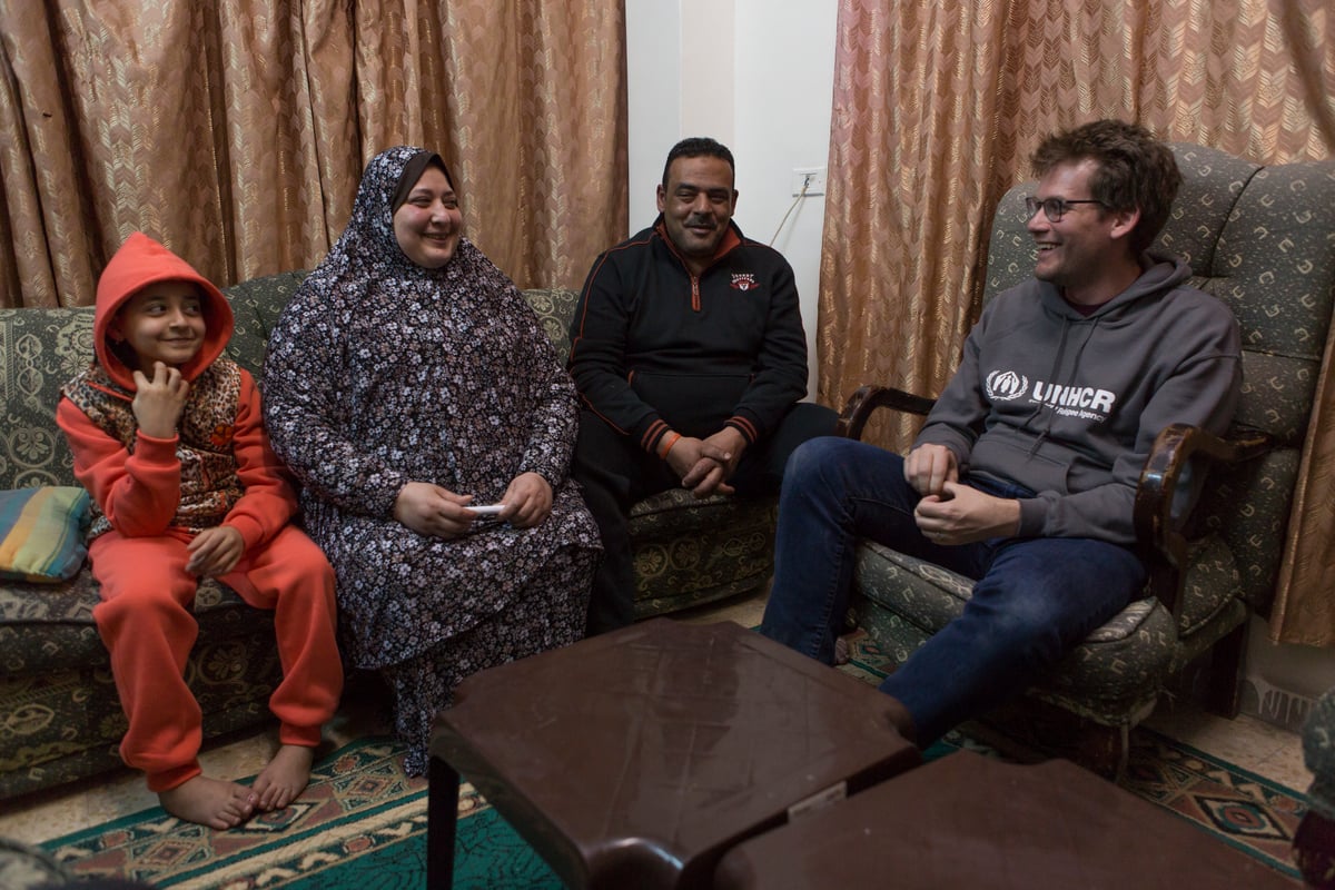 Jordan. UNHCR High Profile Supporter John Green meets Syrian refugee Abu Mustafa and his family