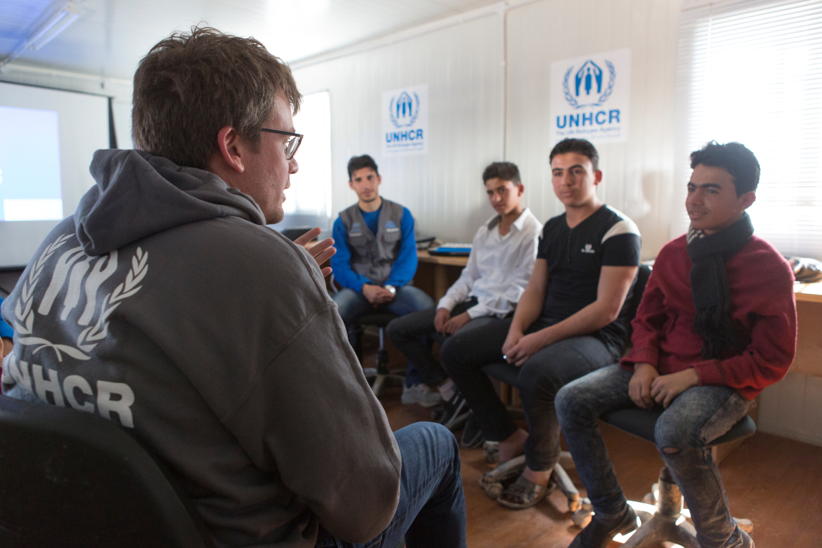Jordan. UNHCR High Profile Supporter John Green meets Syrian refugee photography group at UNHCR funded community centre