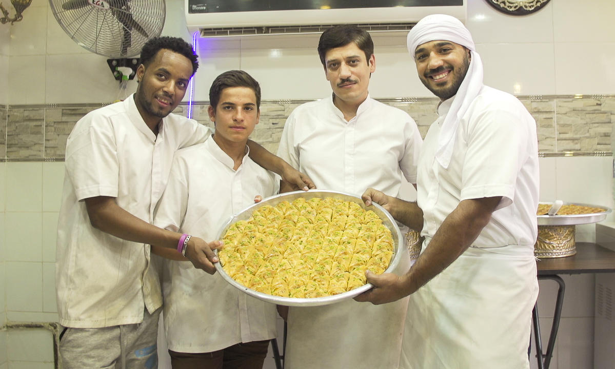 Egypt. The Syrian and Ethiopian pastry chefs who make sweets, bitterly miss home