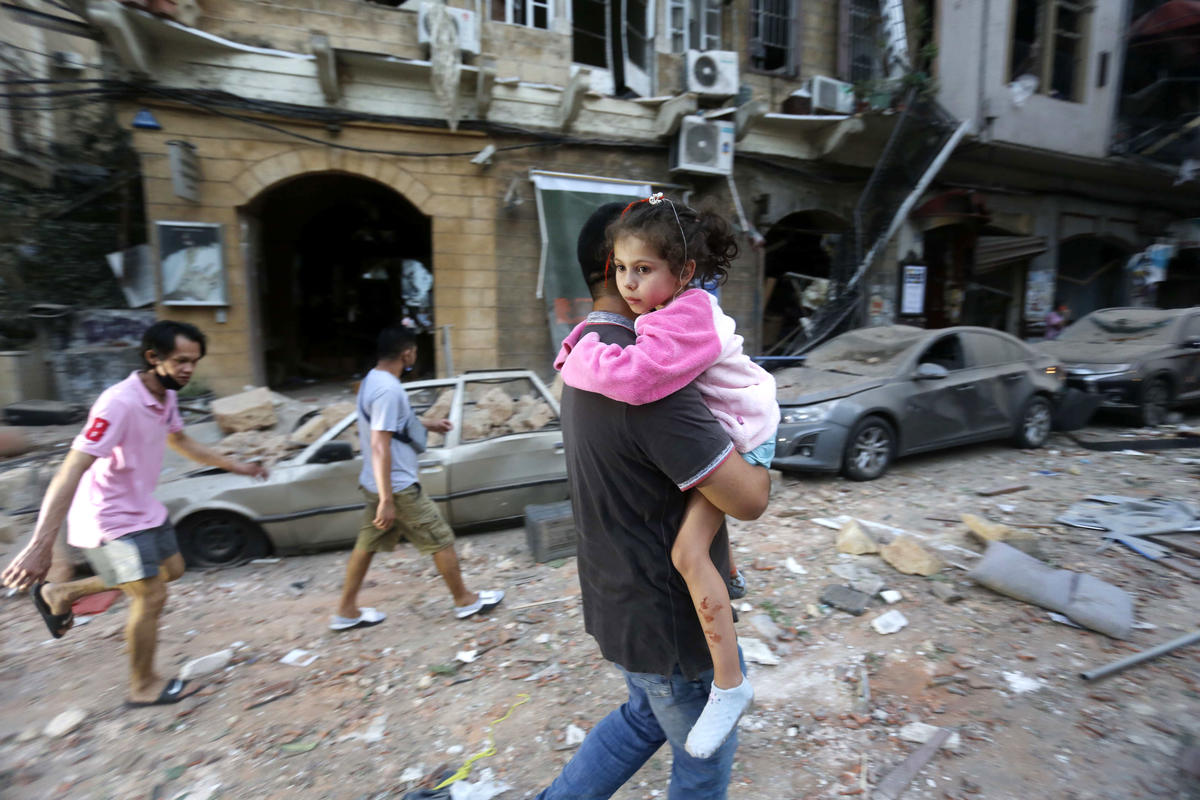 Lebanon. People flee to safety as massive explosion shakes Beirut