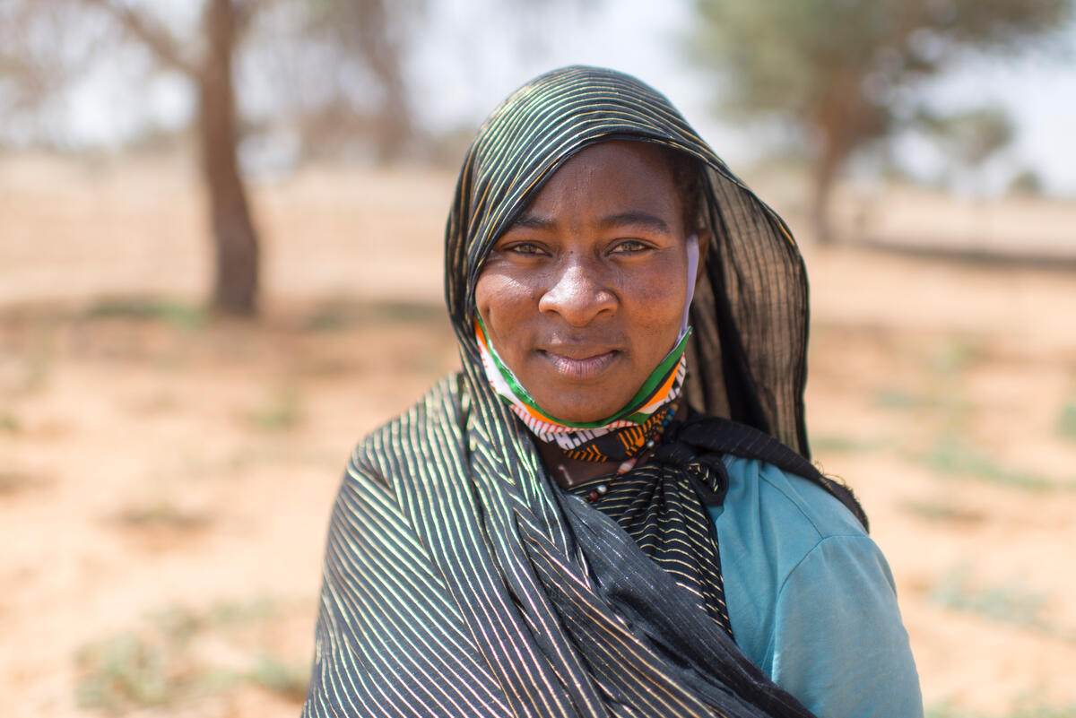 Rabi Saley, 35, who fled Mali after attacks on her hometown, found refuge in Ouallam, Niger, where she works on a market garden with other refugee, displaced and local women.