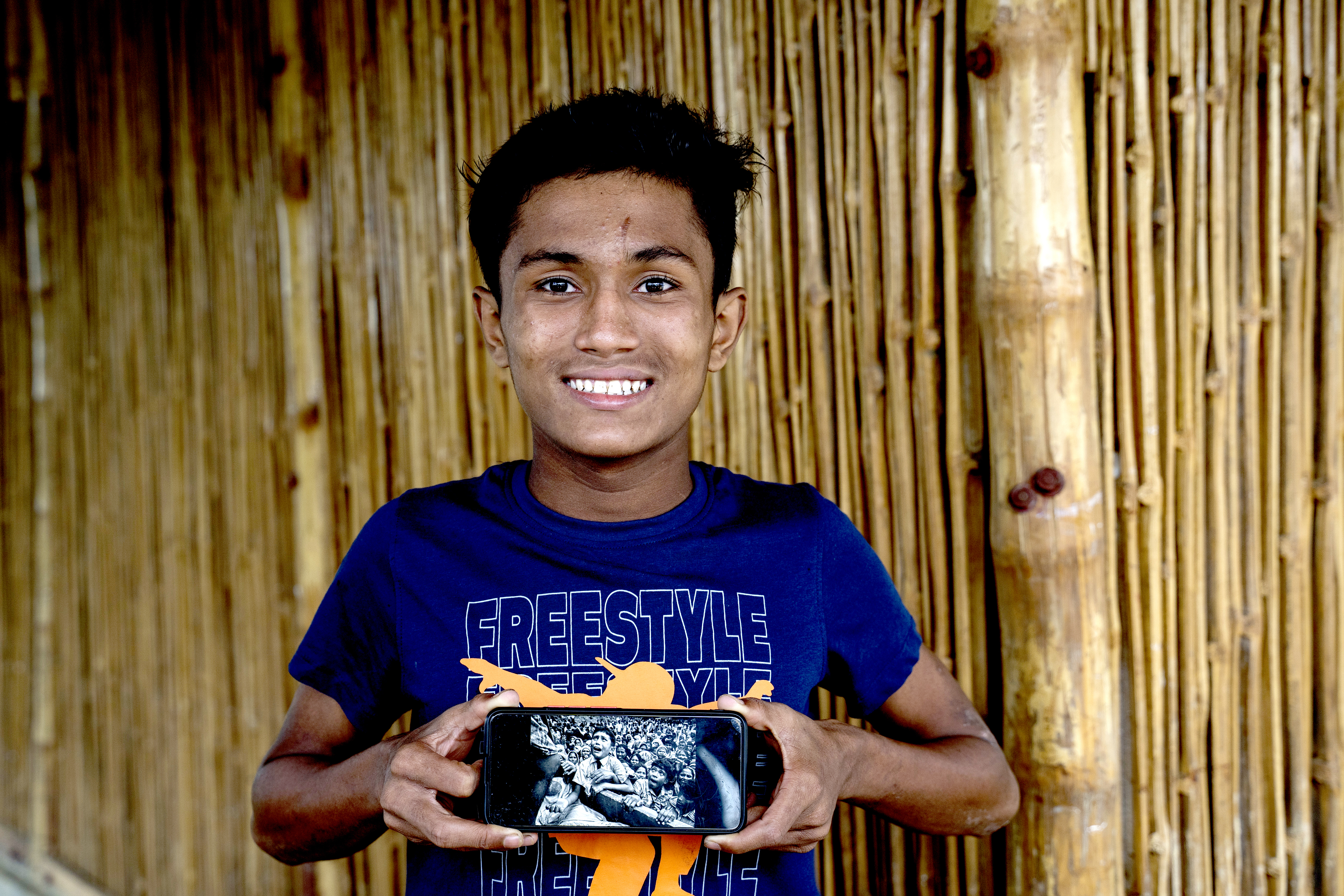 Bangladesh. Mute and deaf Rohingya boy learns language of photography