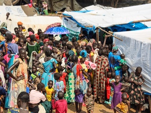 South Sudanese refugee women gather outside a nutrition center in Matar, Gambella, waiting to receive critical assistance. 
