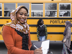 Ekhlas Ahmed with her students in Portland, Maine