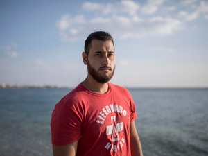 Greece. Syrian refugee helps save lives as volunteer lifeguard