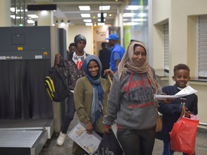 Refugees arrive in Kigalii, Rwanda after an evacuation flight form Libya