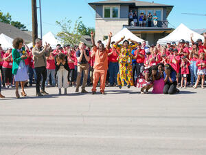 USA. Barobi Family sees their new home for the first time on the build site of Extreme Makeover: Home Edition.