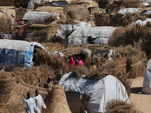 Nigeria. Thatched homes at the Muna Internally displace peoples camp in Maiduguri, Nigeria