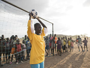 Kenya. Margaret Monday Dominic, 15 plays football with her friends and classmates