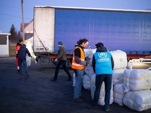 Ukraine. UNHCR distributes blankets to people waiting to cross the border to Poland
