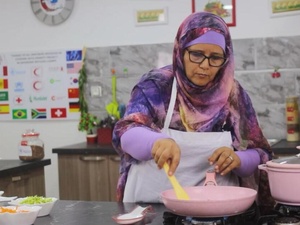 Algeria. Min Chwai (with few ingredients we make meals) refugee TV cooking in Sahrawi camps.