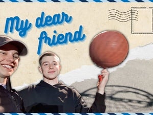 My dear friend: Two smiling boys playing basketball