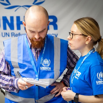 Two UNHCR staff members