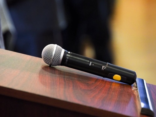 A microphone on a small podest. 