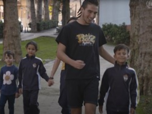 Volunteers and Syrian refugees in Spain