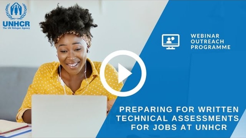 An applicant talking in front of her laptop