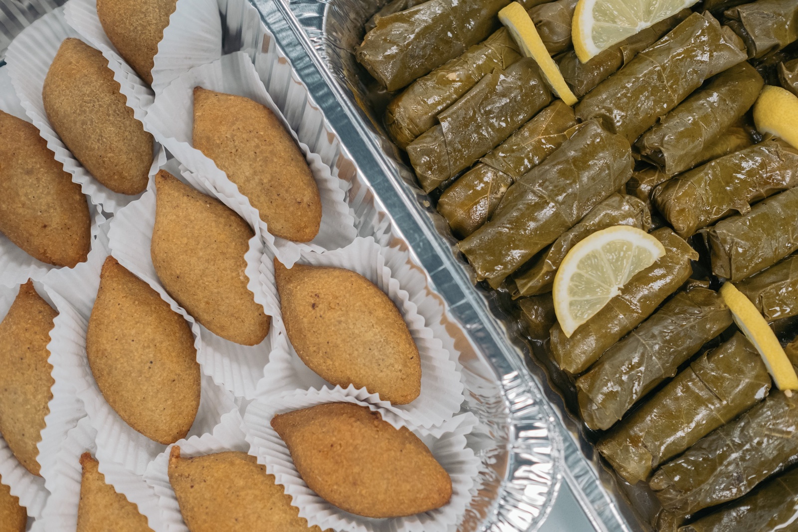 Authentic kibbeh and yalanji prepared by Damascinos in Mozaic’s kitchen. © UNHCR/Jeoffrey Guillemard