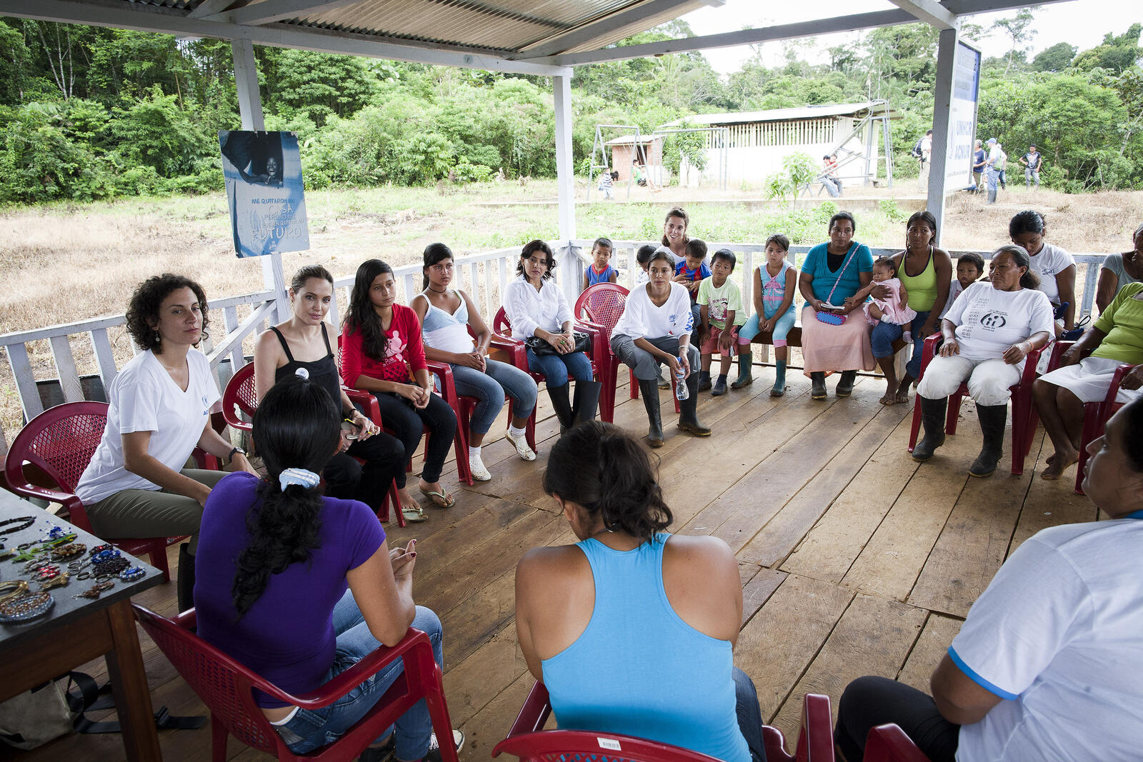 Angelina Jolie (third from left) meets members of the Women's Foundation of Providencia community.