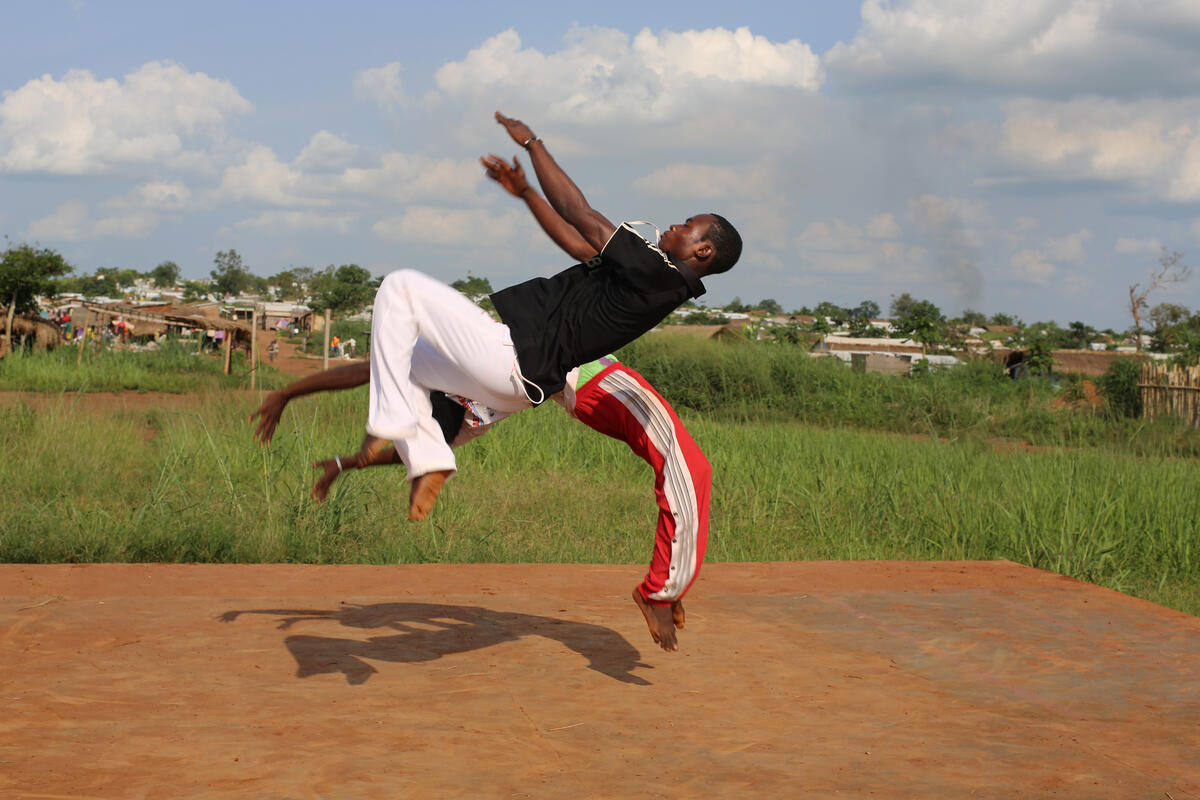 Democratic Republic of the Congo. Capoeiristas in action at Mole refugee camp