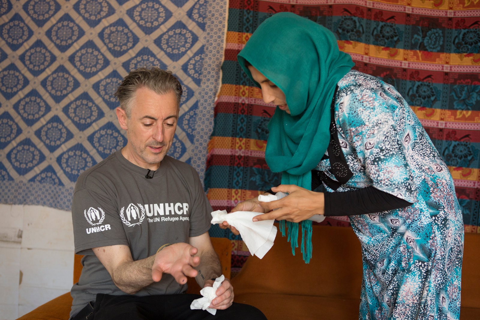 Lebanon. UNHCR High Profile Supporter Alan Cumming meets Syrian refugee Mzyed Haj Khalaf and his family at Rass Maska informal settlement
