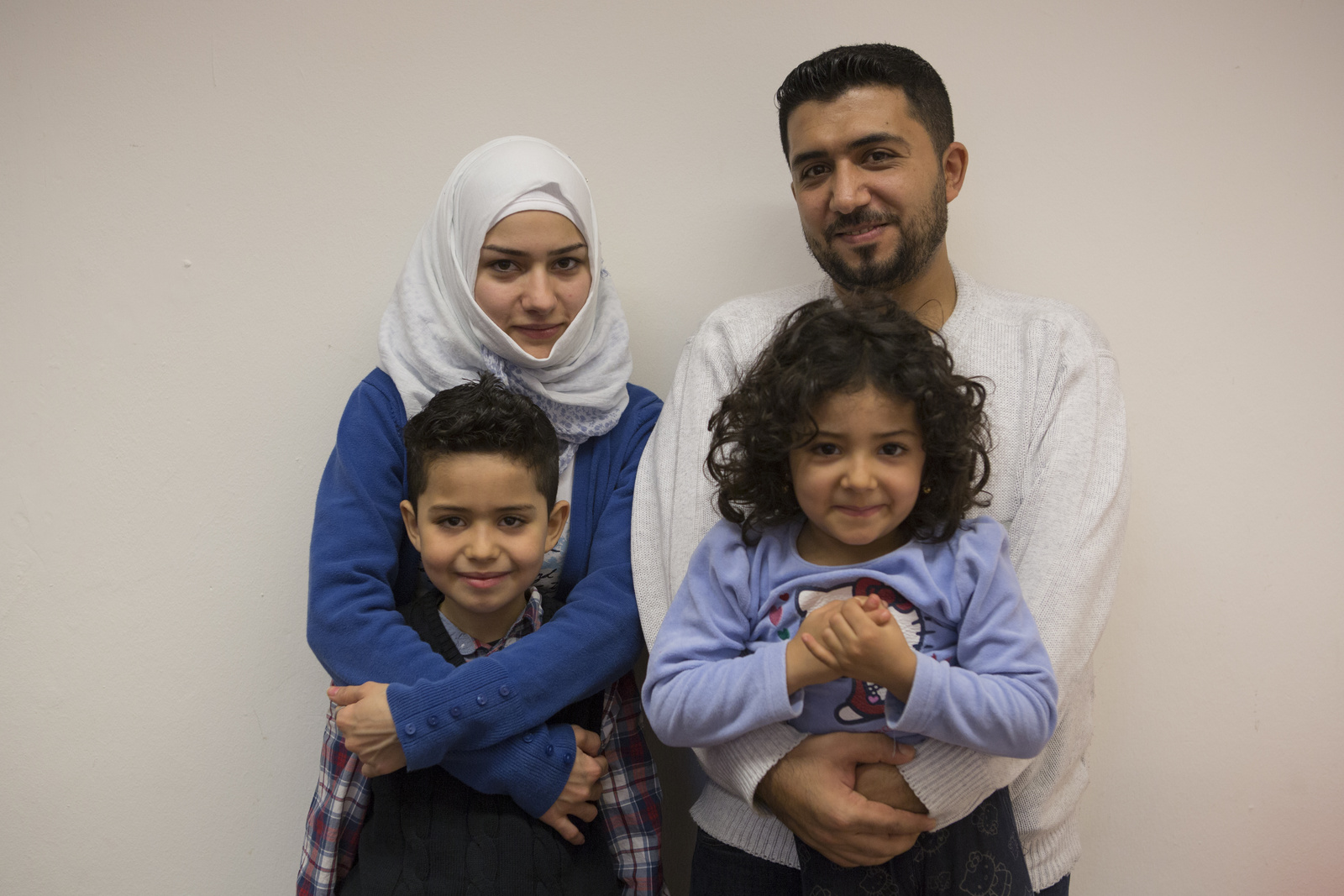 Germany. Actor Ben Stiller meets Nahed and her family at an emergency shelter in Berlin