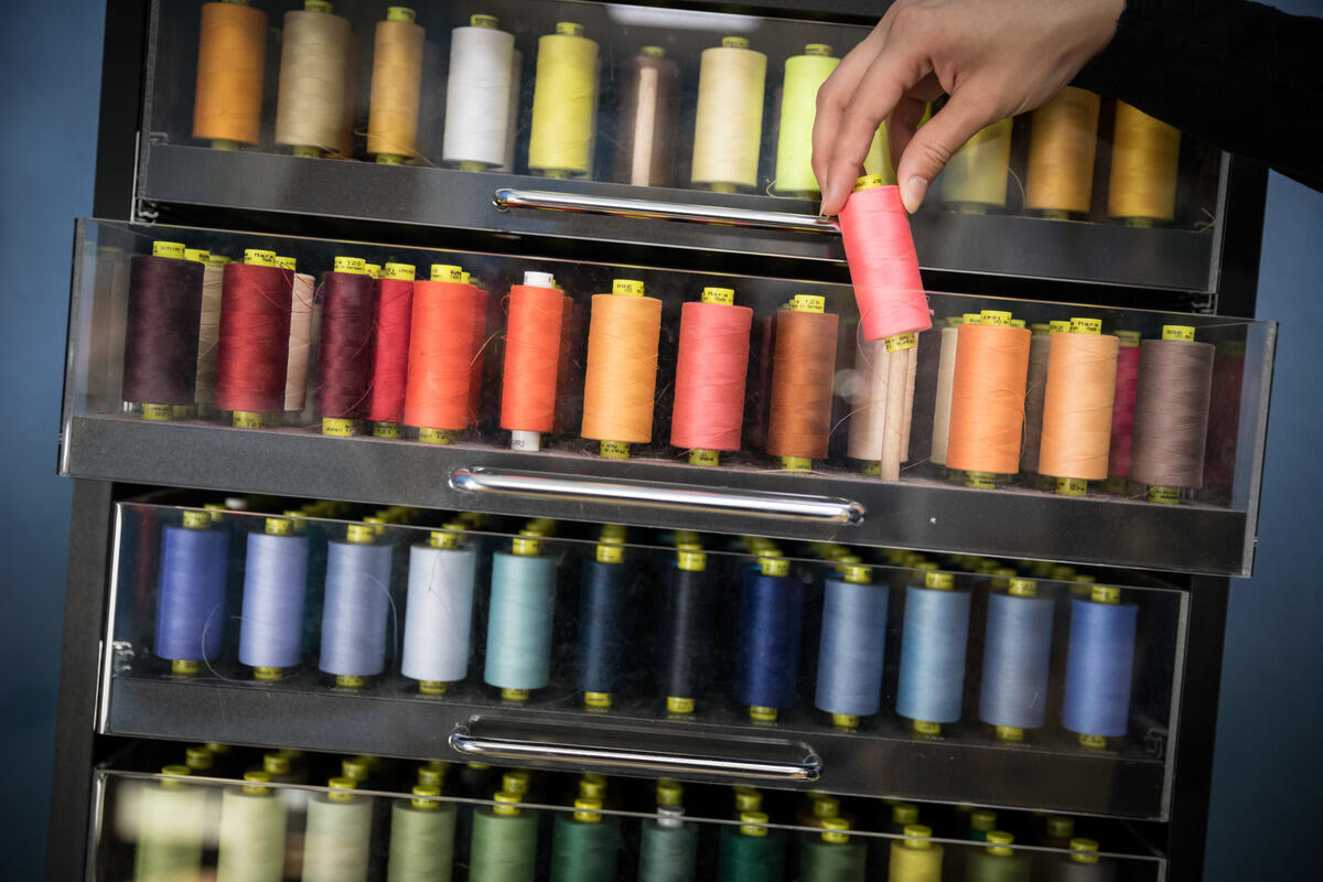 Germany. Refugee women got a job as a seamstress in a Frankfurt fashion workshop.