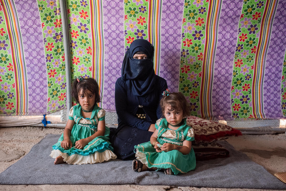 Iraq. People adjusting to life after losing their husbands and fathers.