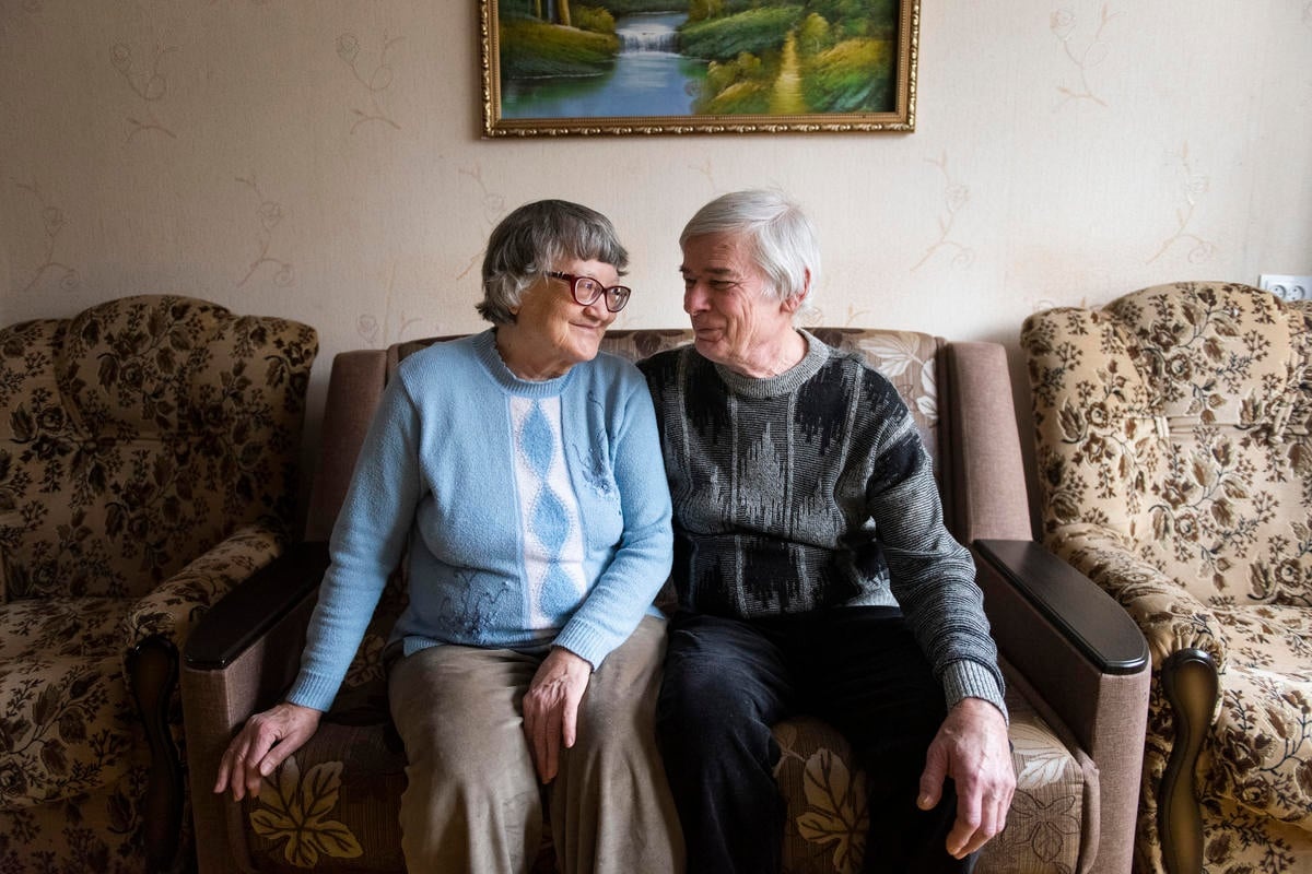 Ukraine. Internally displaced persons sit in the living room of the apartment they are renting on the government-controlled side of the Donbas area