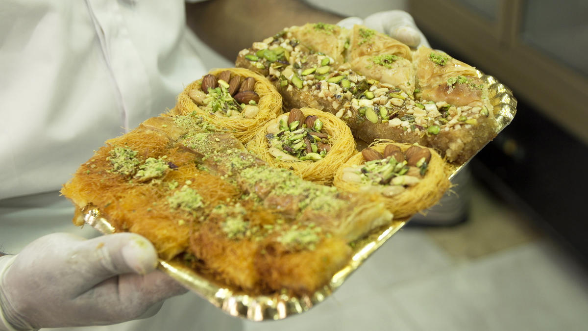 Egypt. Syrian refugees sell sweet memories of Damascus