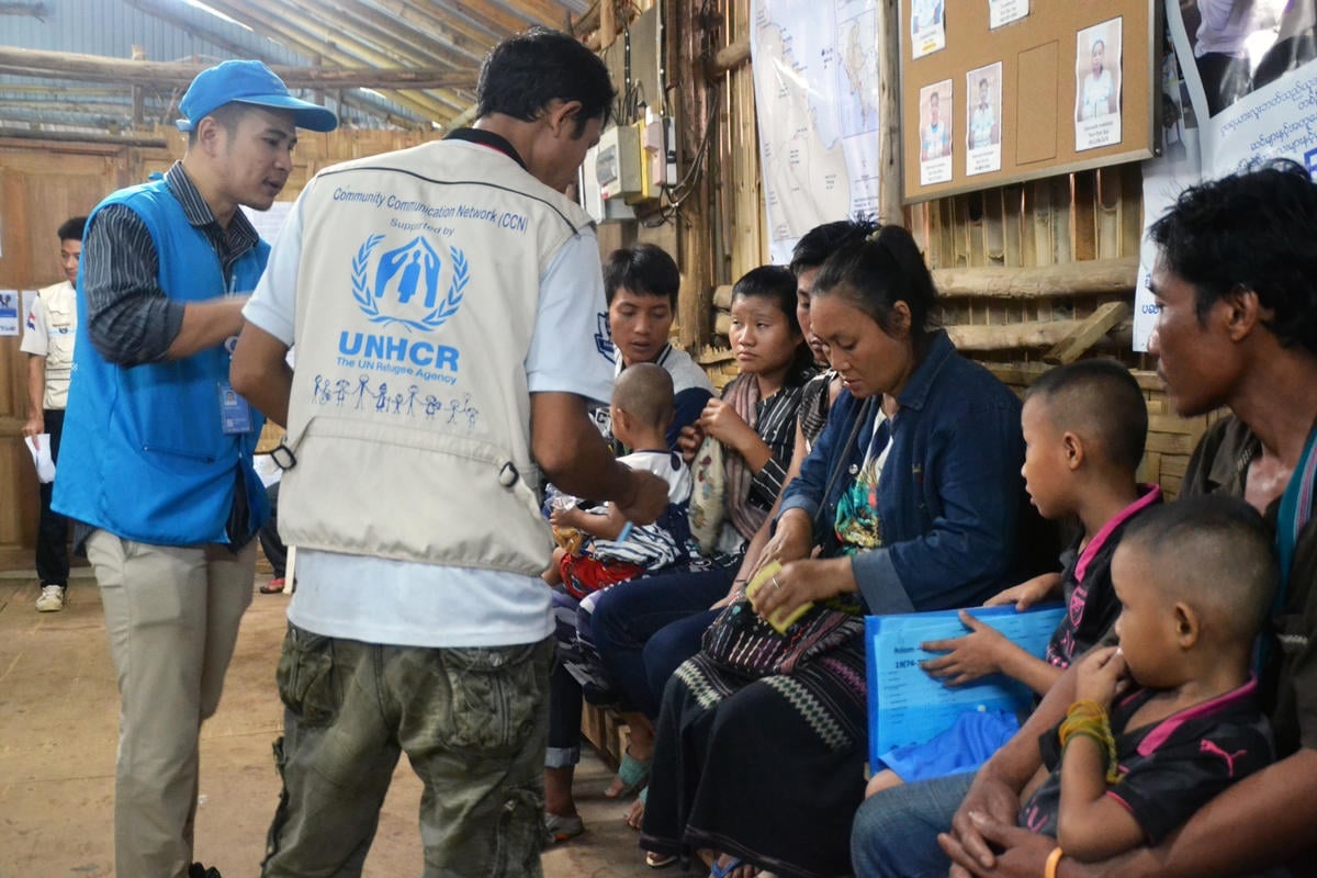 Thailand. Voluntary returnees leave shelters, bound for Myanmar
