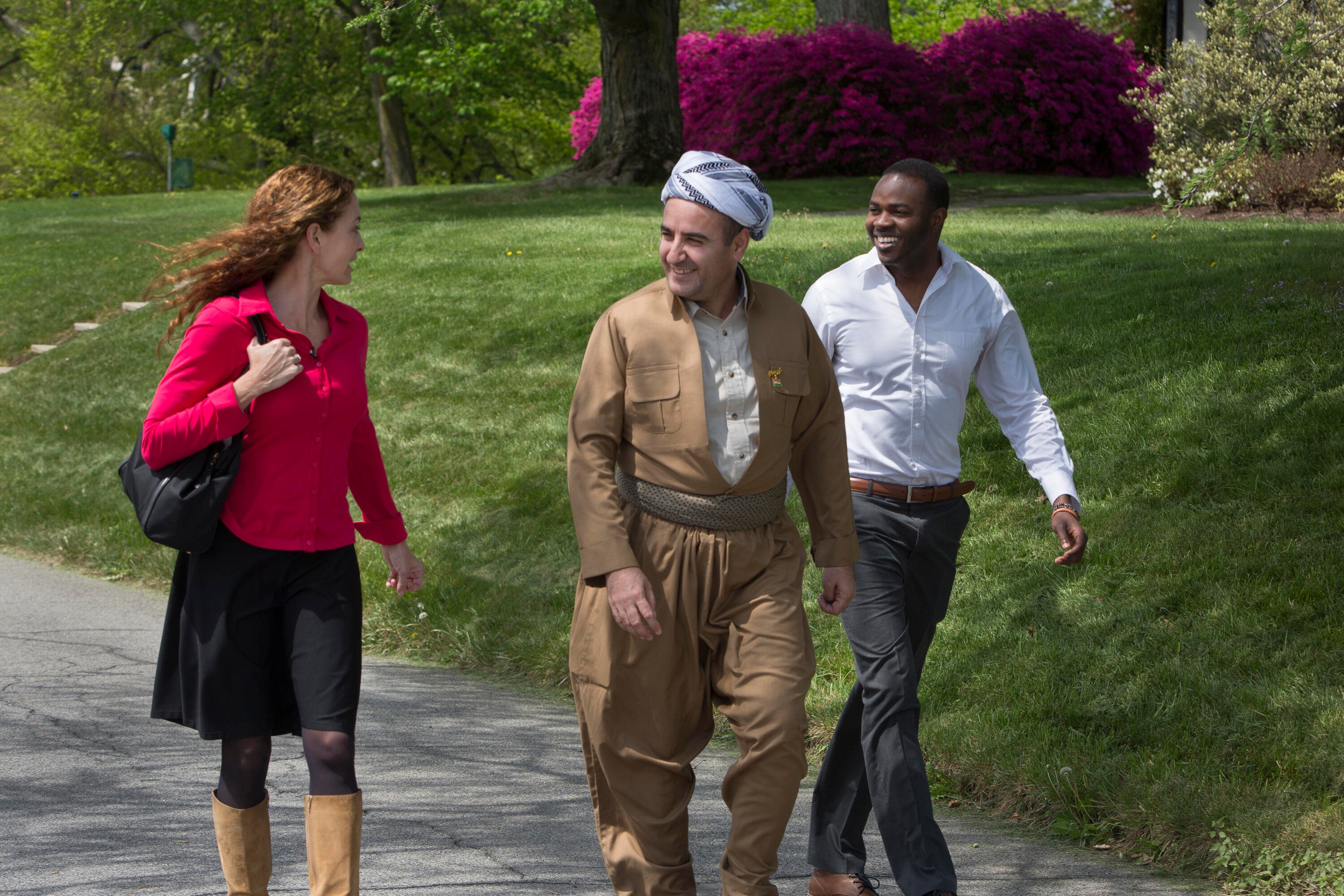 Miranda Kaiser with Refugee Center Online Board Members Naser Yahya and Mohy Omer